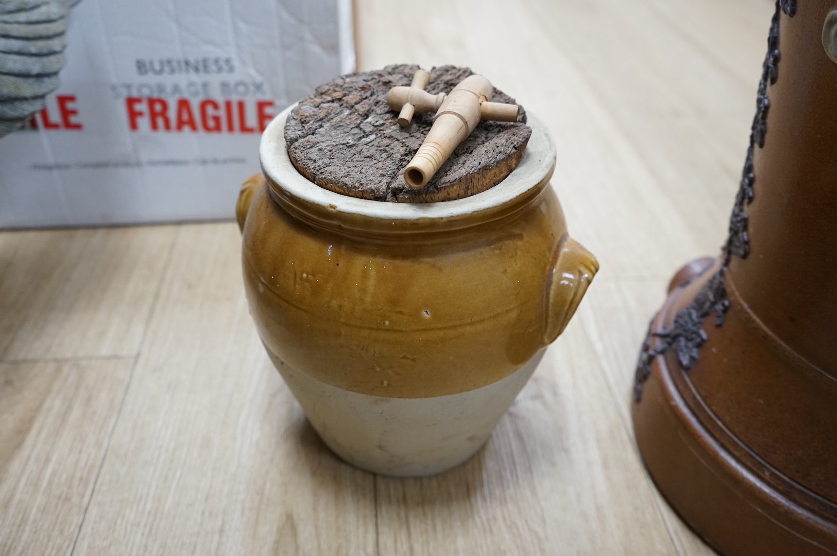 A Victorian salt glazed water filter and a stoneware jar, tallest 48cm